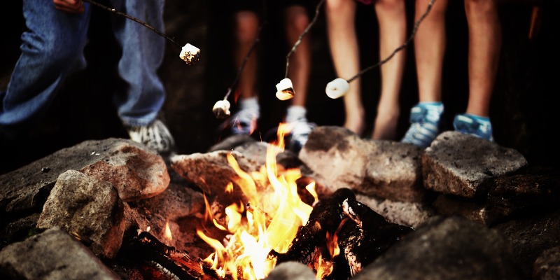 Roasting marshmallows - 5 Ways to Style Your Outdoor Fire Pit or Fireplace