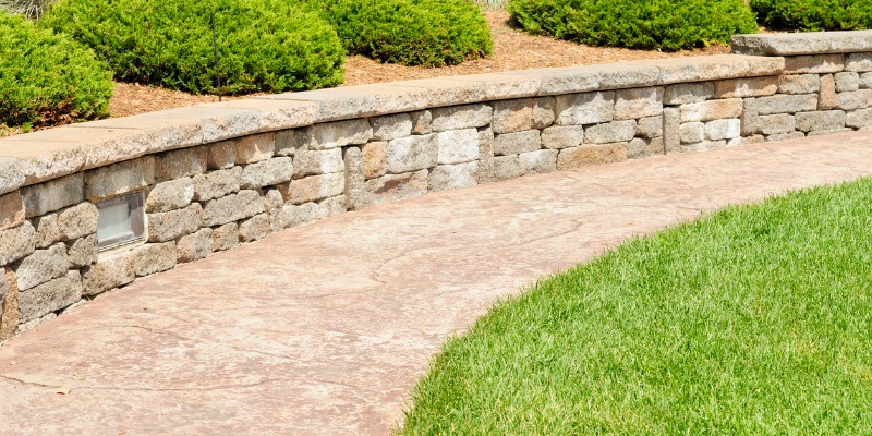 Concrete retaining wall pathway